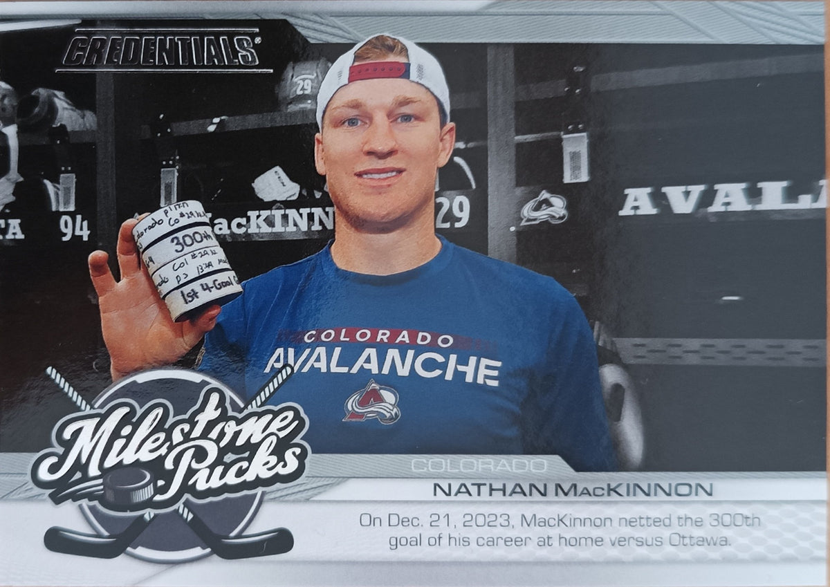 Insertní karta Nathan MacKinnon 24-25 Credentials Milestone Pucks Upper Deck